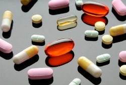fibromyalgia medication, various pills on table